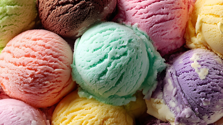 An overhead view of multicolored scoops of ice cream
