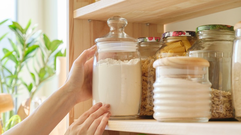 Flour in jar in pantry
