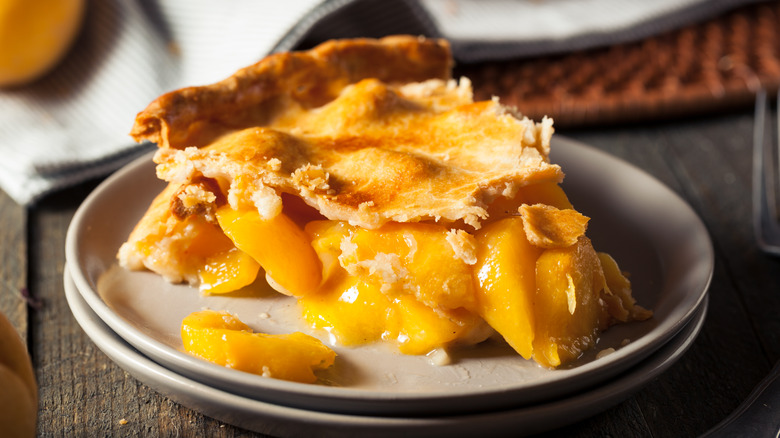 Slice of peach pie
