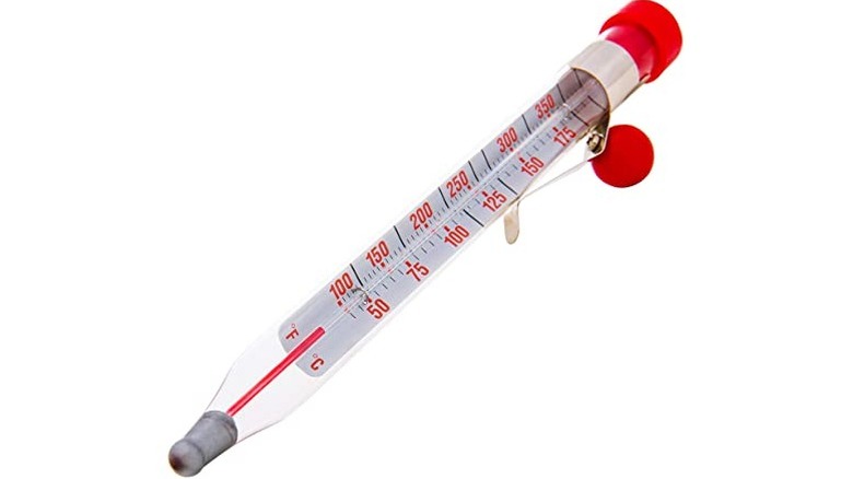 candy thermometer on white background