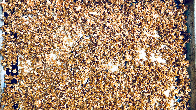 walnut cauliflower mixture on baking sheet