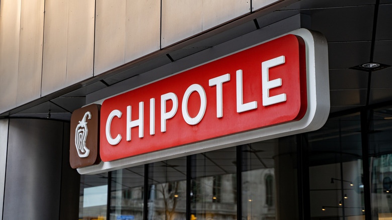 Chipotle sign with pepper logo on building