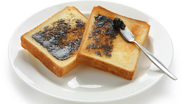 Marmite spread over toasted bread