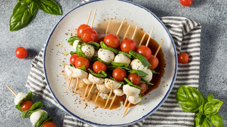 plate of caprese skewers