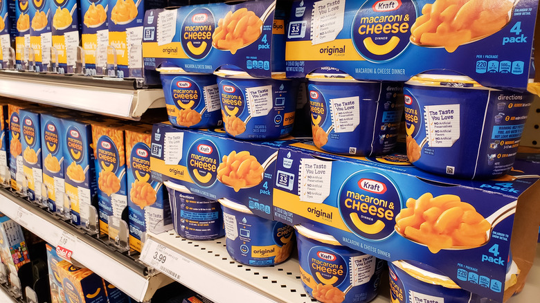 packs of kraft macaroni and cheese on a store shelf
