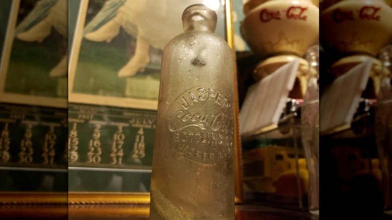 Low angle view of a vintage Coca-Cola Hutchinson bottle