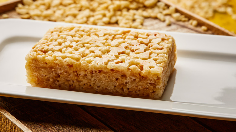 A Rice Krispies treat on a white plate