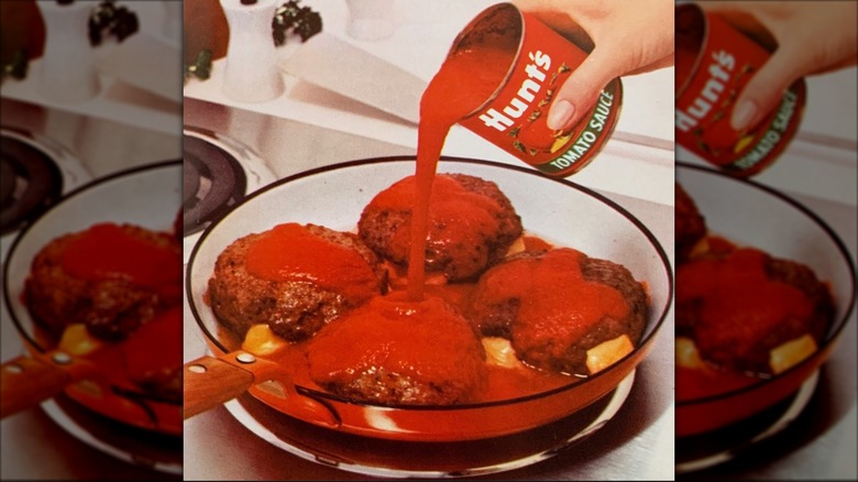 A vintage advertisement of Fancy Pants Hamburgers placed in a skillet with tomato sauce being poured over them