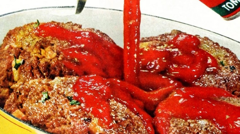 A vintage advertisement showing Hunt's tomato sauce poured on burgers