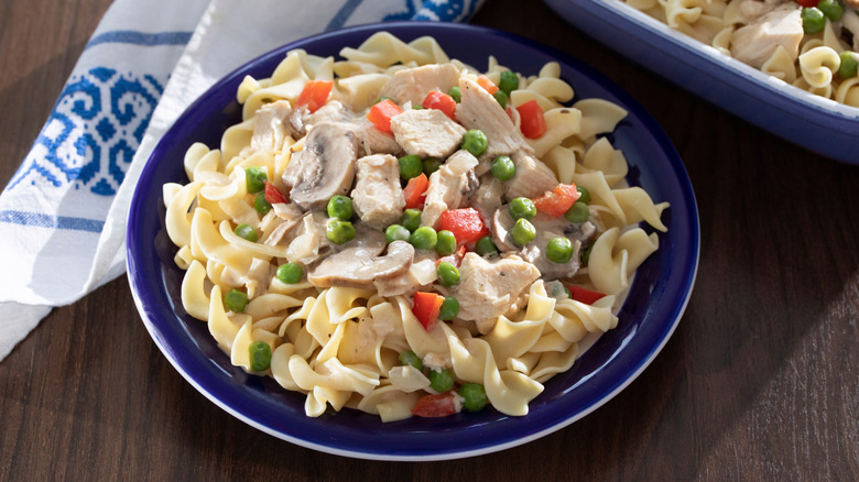 Chicken a la King, served over pasta noodles