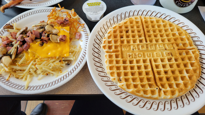 waffle house waffle on a plate next to hashbrown with toppings