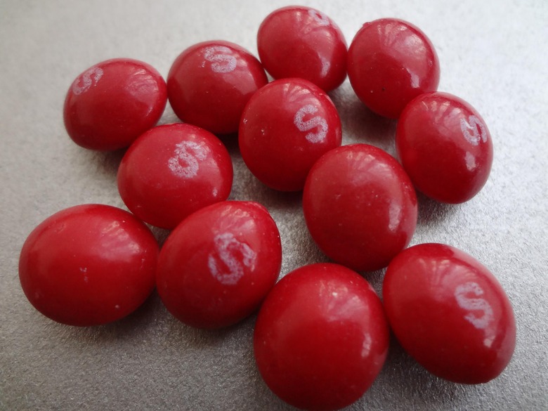 Why are red skittles considered "nutritious" for cattle?