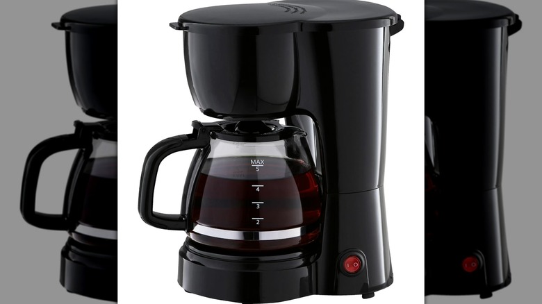 A Mainstays 5-Cup Coffee Maker on a white background