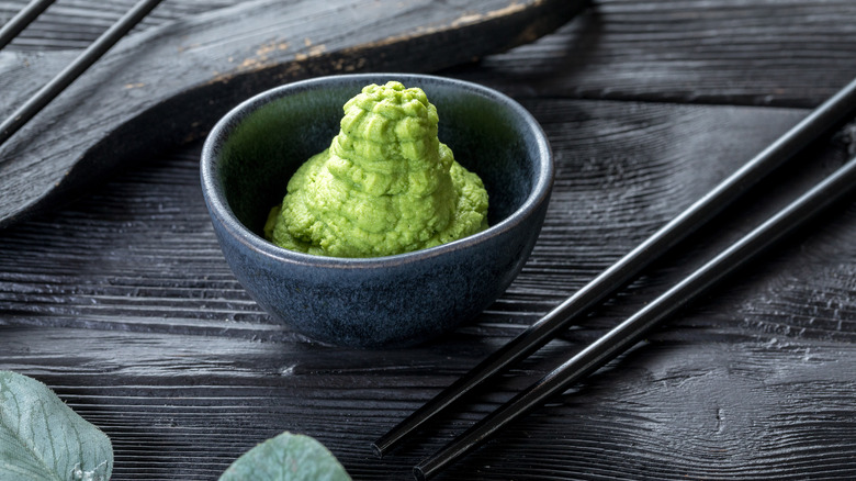 Wasabi paste in black bowl