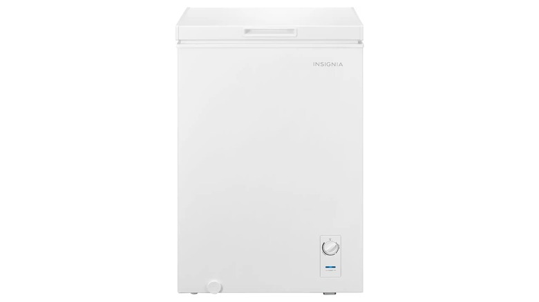 A white chest freezer on a white background