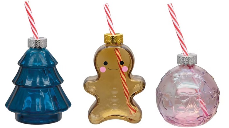 A collage of Aldi's ornament sippers, left to right: blue Christmas tree, amber gingerbread man, pink round ornament