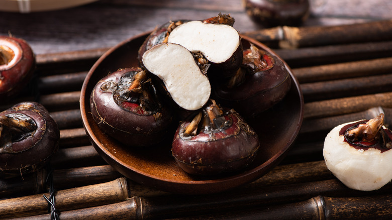 bowl of water chestnuts with skin