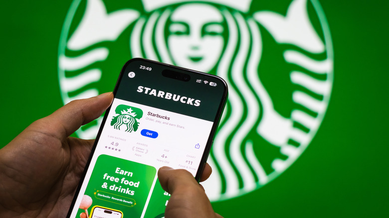 An iPhone showing the Starbucks app available in the app store