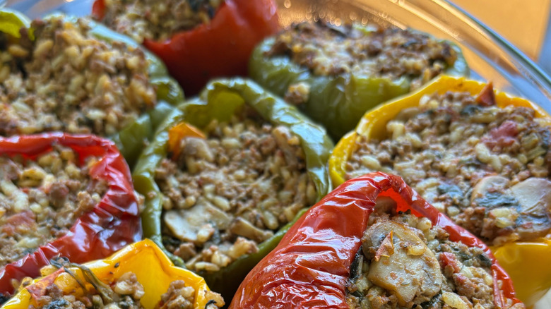 baking stuffed peppers in a glass dish