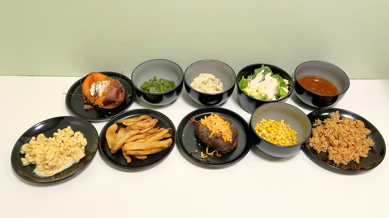 A group of ten Texas Roadhouse sides together on a green and white background