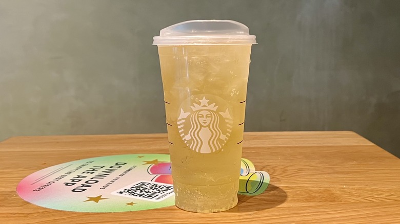 golden Starbucks' tropical citrus drink in cup