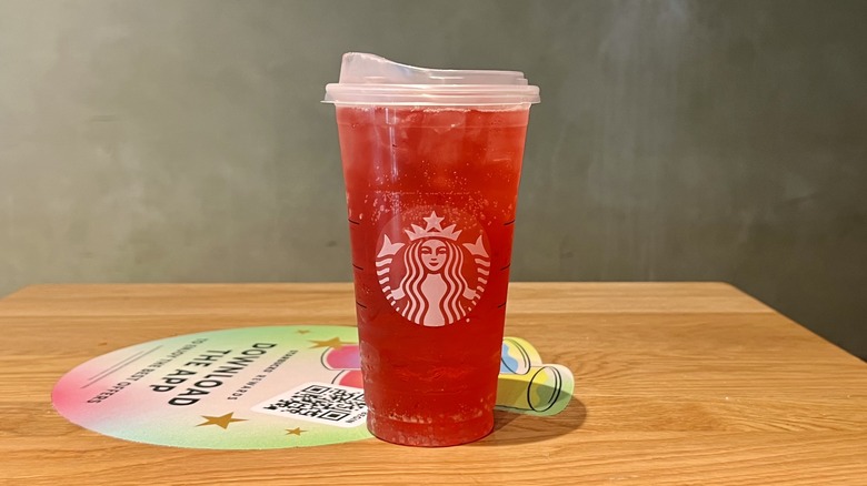 red Starbucks melon burst energy drink in cup