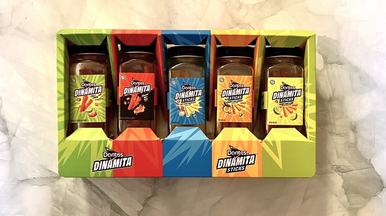five bottles of Dinamita flavors