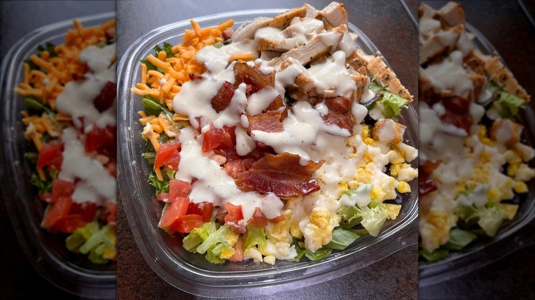 Wendy's Cobb salad topped with dressing