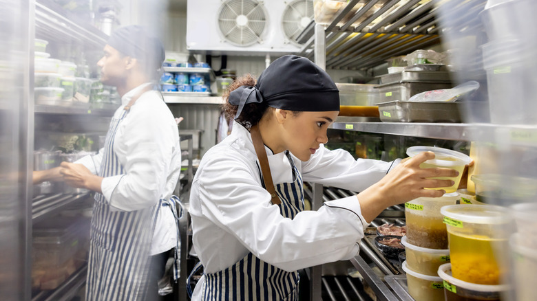 Two Chefs working in a restaurant kitchen
