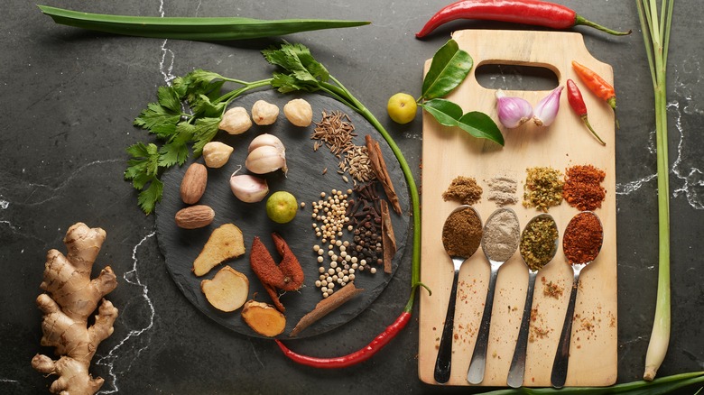 Candlenuts, spices, and other ingredients used in South Asian cuisine 