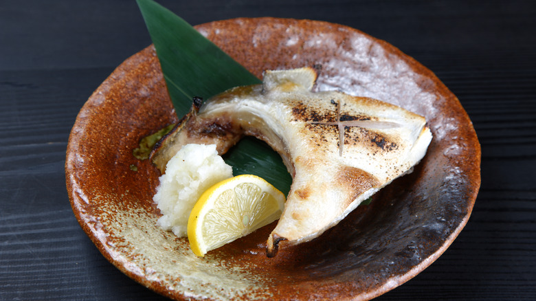 Grilled fish collar with lemon
