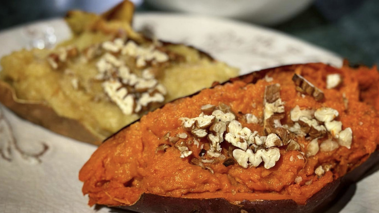 Plate with baked white sweet potato and baked orange sweet potato