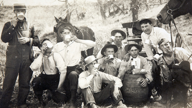 cowboys drink mugs of coffee