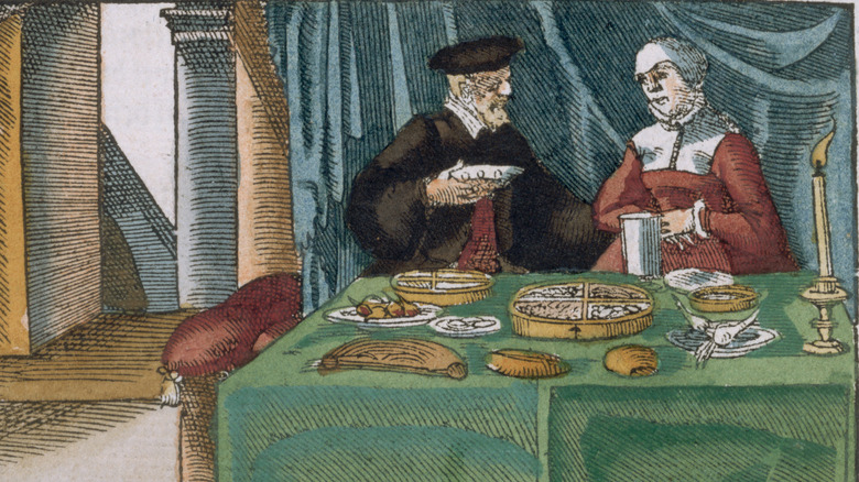 Vintage illustration of a medieval couple at dinner table