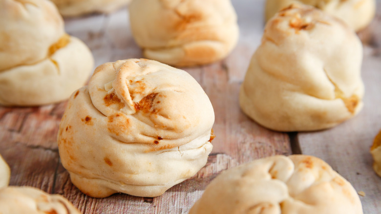 Ootato knishes on a table
