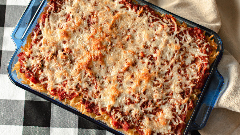 Spaghetti bake topped with cheese