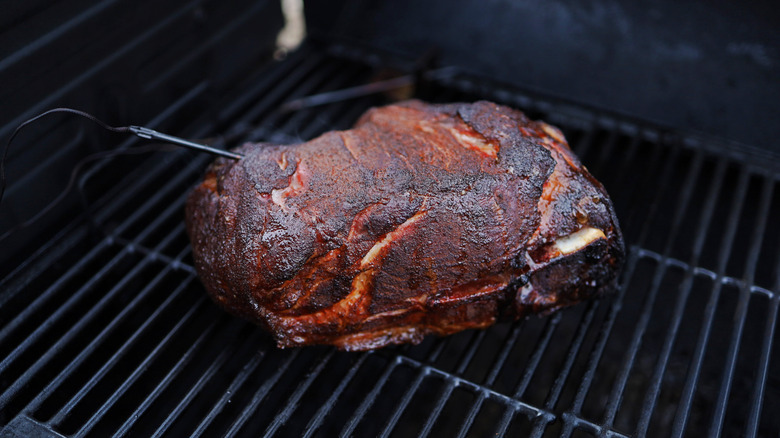 Crusted brisket on smoker