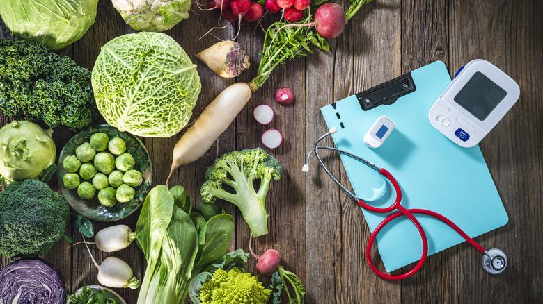 fresh vegetables and scale