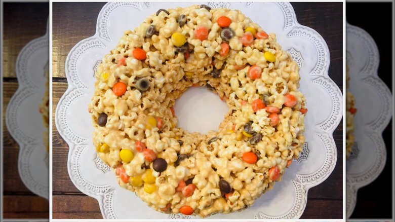 Popcorn cake with Reese's Pieces on doily