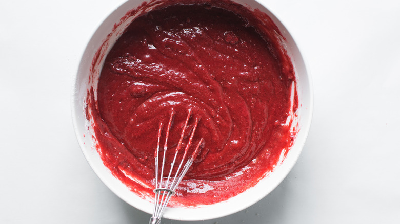 Red velvet cake batter in a bowl