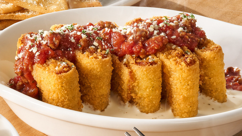 Olive Garden Lasagna Fritta topped with sauce