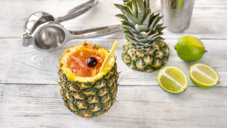 Bahama mama cocktail in a pineapple