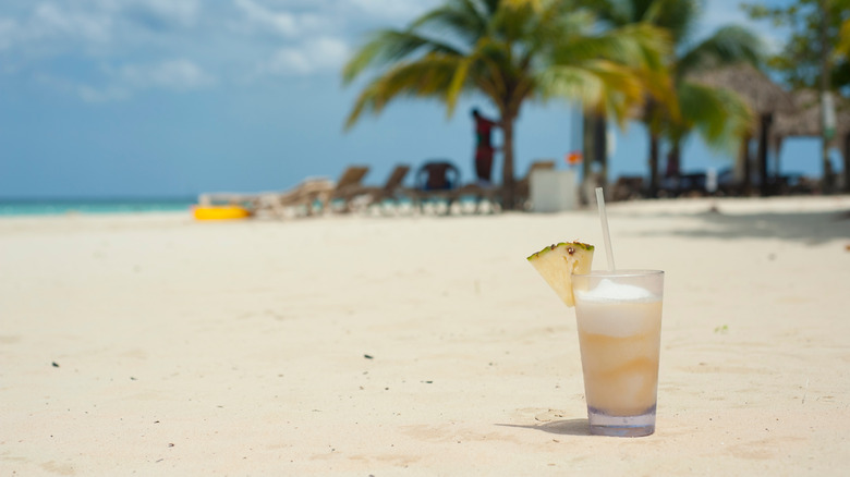 Bahama Mama cocktail on a beach