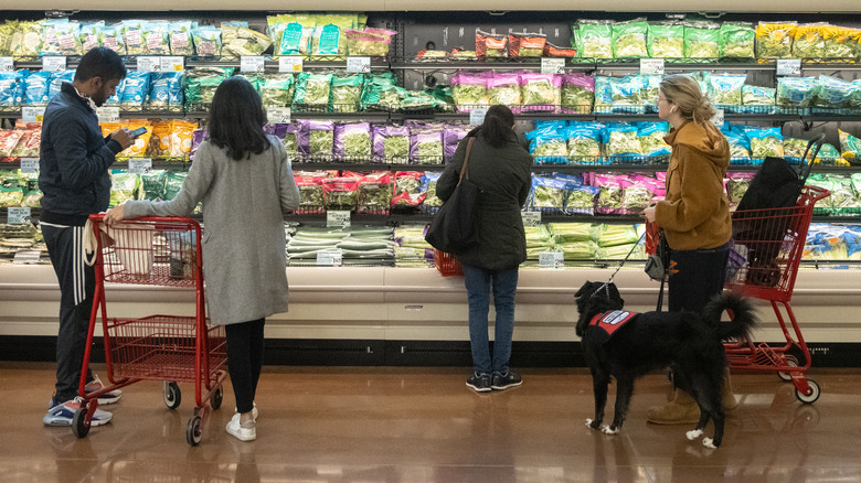 Customers shopping for produce at Trader Joe's