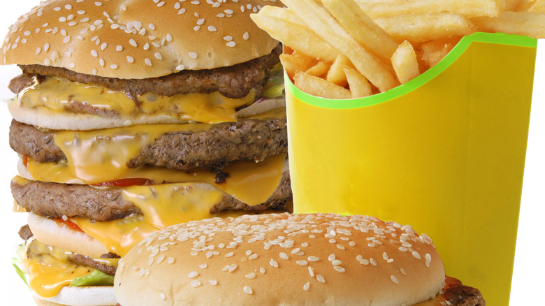Quadruple cheeseburger, fries, and burger