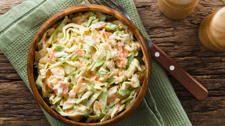 bowl of classic coleslaw on green napkin