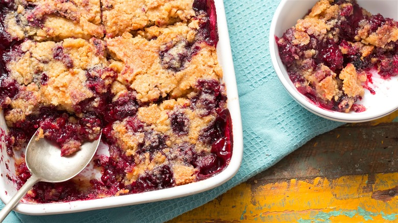 Berry dump cake with spoon 