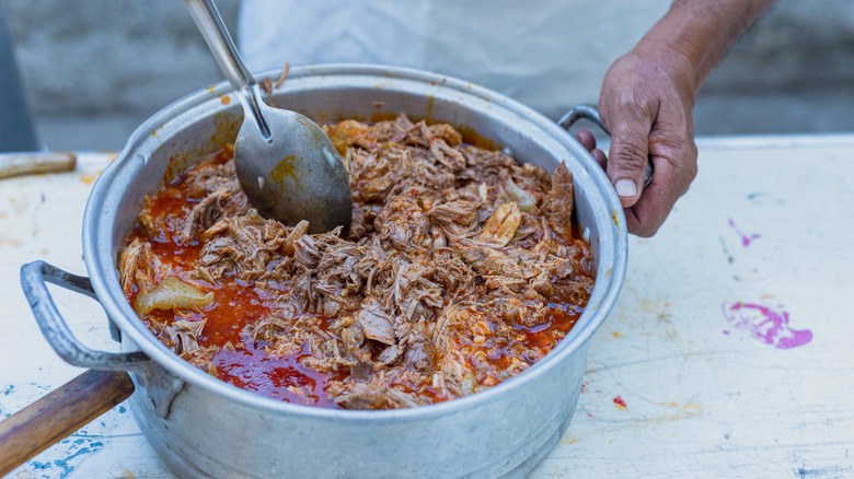 pot of birria cooking