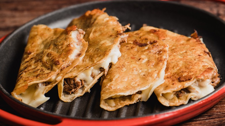 birria tacos in a pan