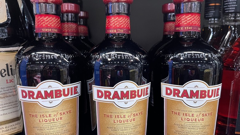 bottles of drambuie on a shelf